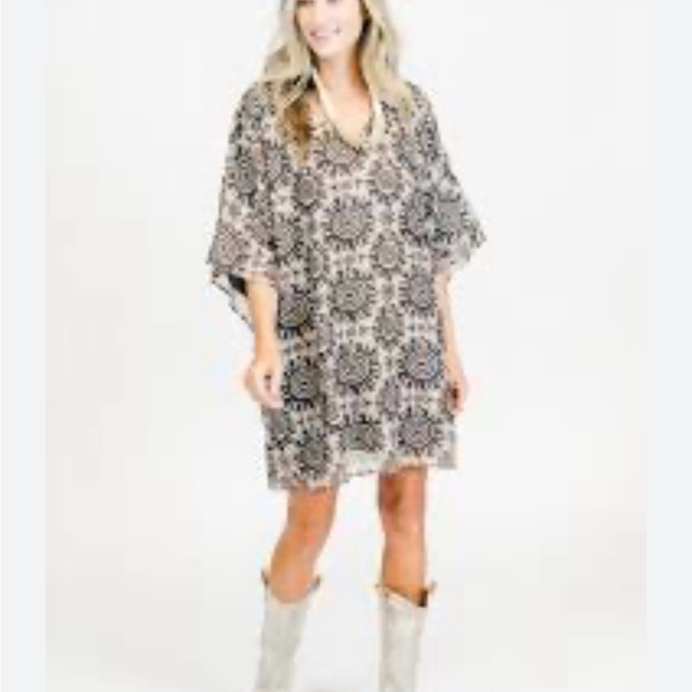 Solelia Brown and white printed mini caftan . Lined and brand new!
